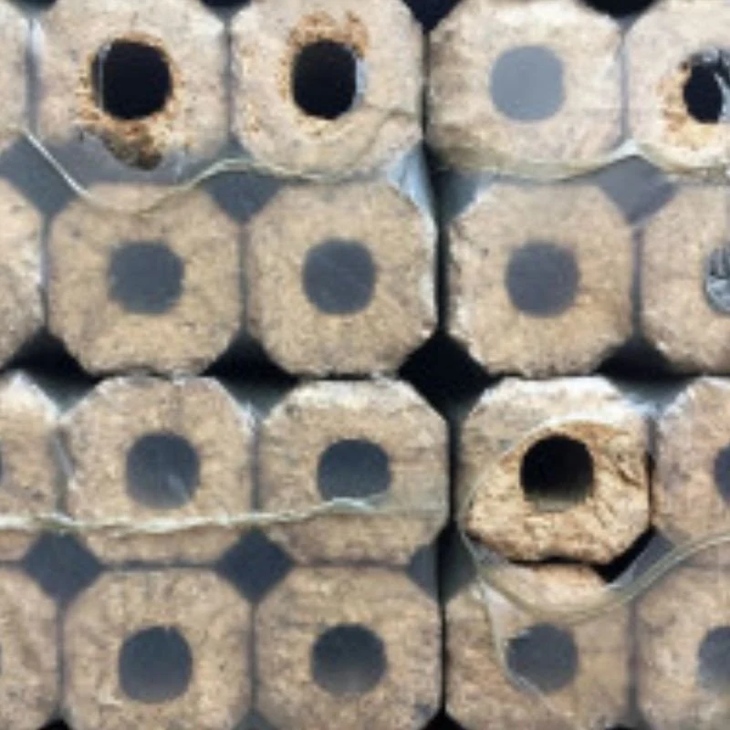 Extrémités de briquettes à trou central